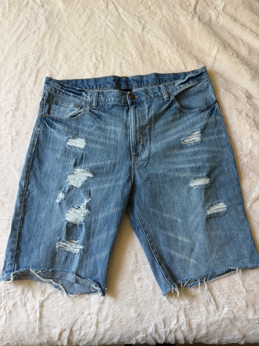 Distressed Women's Blue Denim Jeans